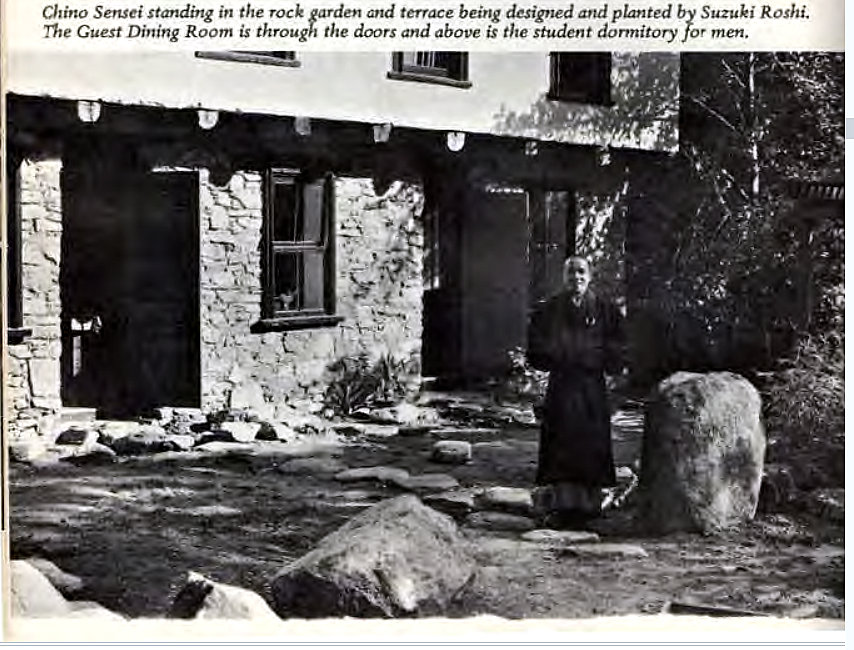 Machine generated alternative text:
Chino Sensei standing in the rock garden and terrace being designed and phnted 
Guest Dining Room is through the doors and above is the student dormitory 
Suzuki Roshi. 
men. 